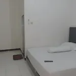 Oyo 93306 Homestay Permana Supadio Airport